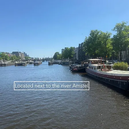 Vakantiehuis Joyjoyjoy The Palm Ecolicious In A In Historic Canalhouse From 1729 With View On The Canals Amsterdam